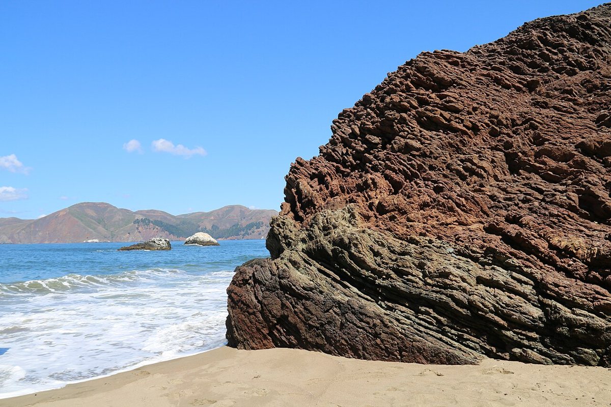 Rolling green hills and coastal bluffs of the Marin Headlands overlooking the Pacific Ocean