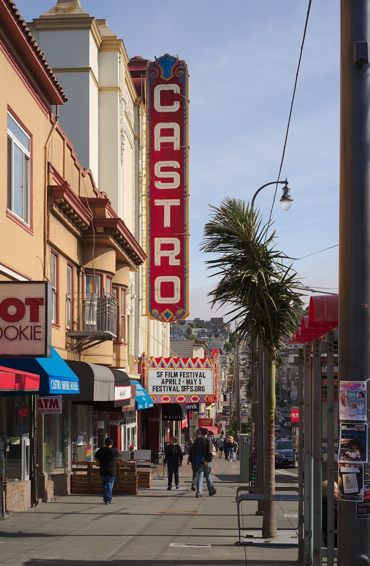 ornate facade of the Castro Theatre with illuminated marquee on Castro Street